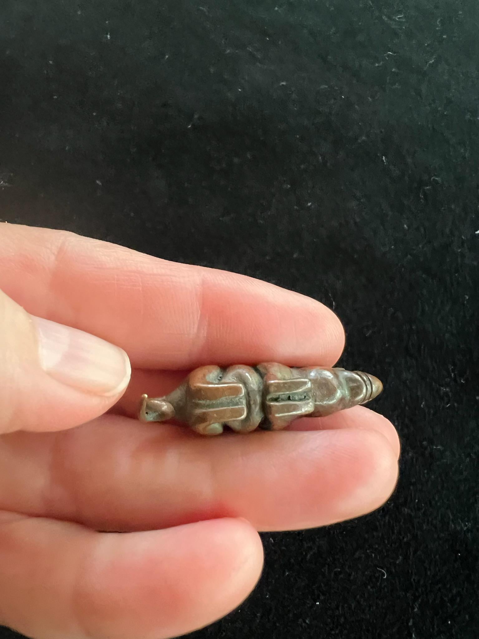 Jewel Spitting Mongoose Charm | Metal | Approx 1 1/2 inches Long | Tibet | Nehulay | 1 cord included