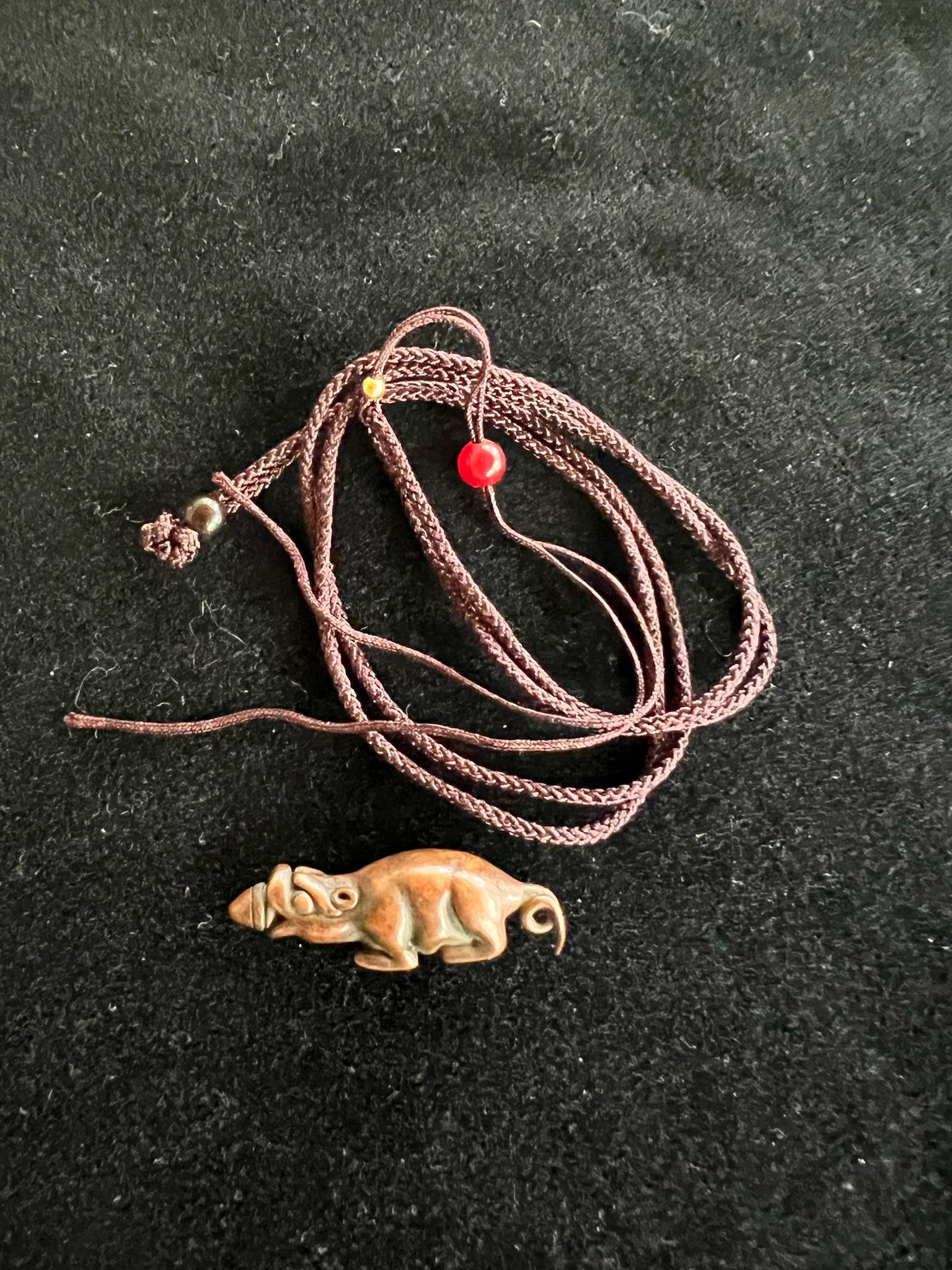 Jewel Spitting Mongoose Charm | Metal | Approx 1 1/2 inches Long | Tibet | Nehulay | 1 cord included