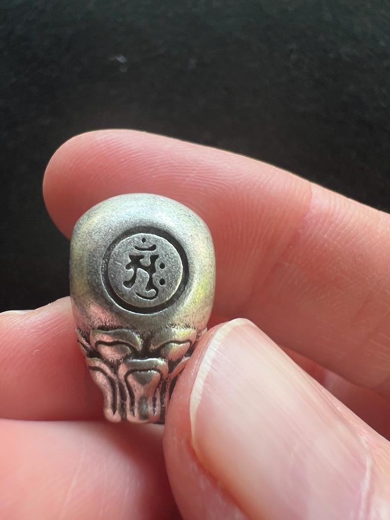 Buddha Guru Bead | Metal | Approx 3/4 inches Long by 1/2 inches Wide | Tibet