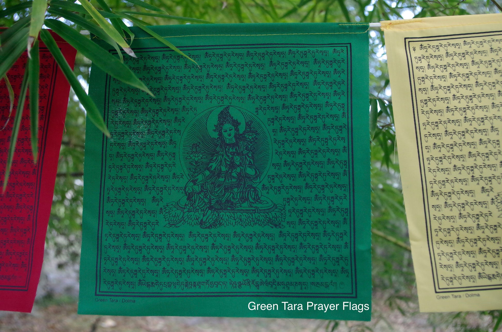 High-quality Green Tara prayer flag from 5-color set of 10, 10x10 in each. Imprinted in black ink with revered image of female Buddha of Compassion.&quot;