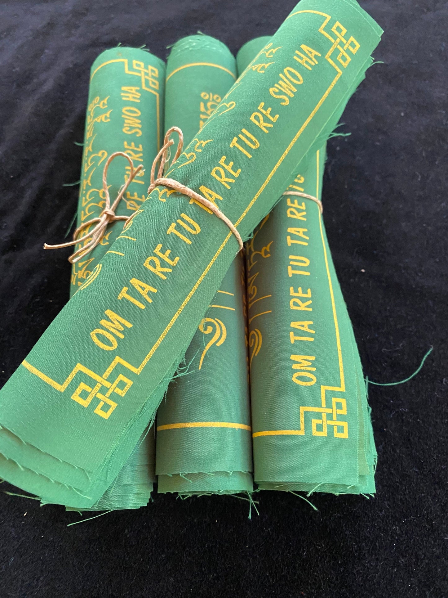 Green Tara prayer flags: 4 rolls of high-quality Tibetan flags, 10 flags/set, 8x8 in. each, green cloth with yellow Tara image.