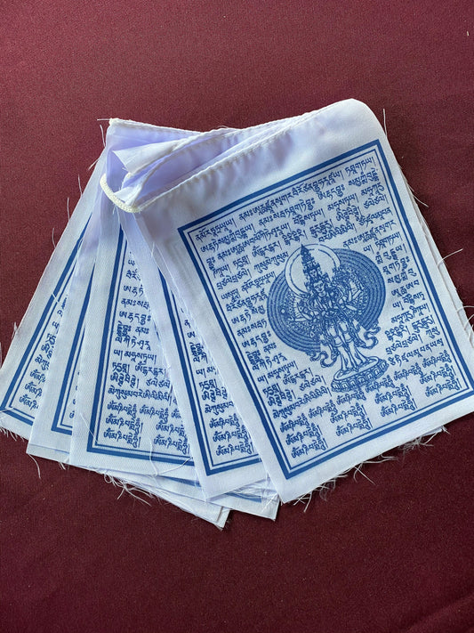 A set of 10 all white 1000 Armed Chenrezig flags imprinted in light blue on a dark background
