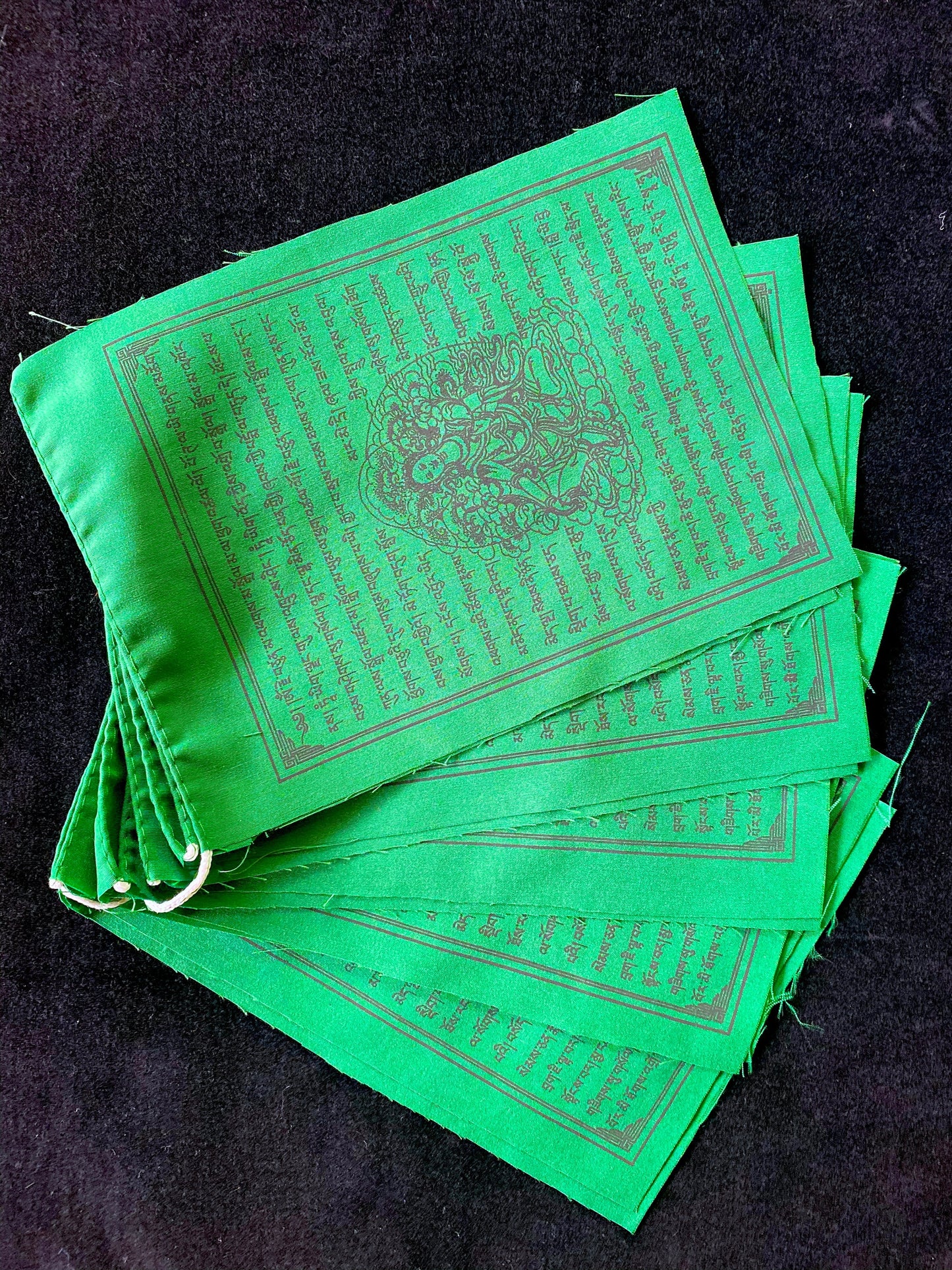 Set of 10 Green Tara flags on 10-flag strand. High-quality Tibetan prayer flags, 6x7.5&quot;, black ink, for indoor/outdoor use