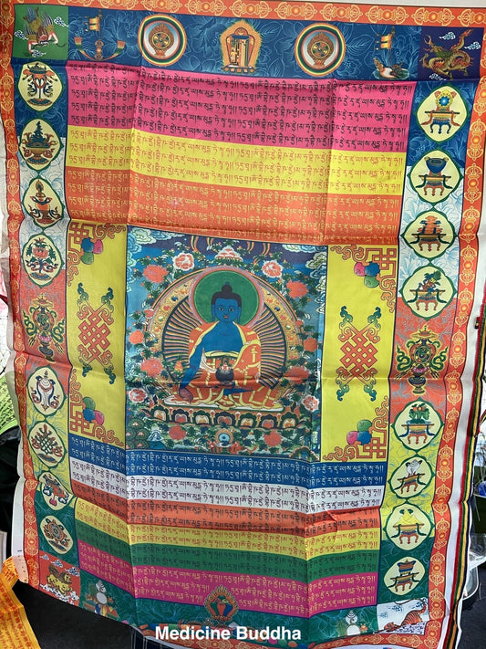Medicine Buddha Tibetan Prayer Banner: High-quality poly silk flag imprinted with Medicine Buddha. Measures 27x39 inches, suitable for hanging on a pole or a wall