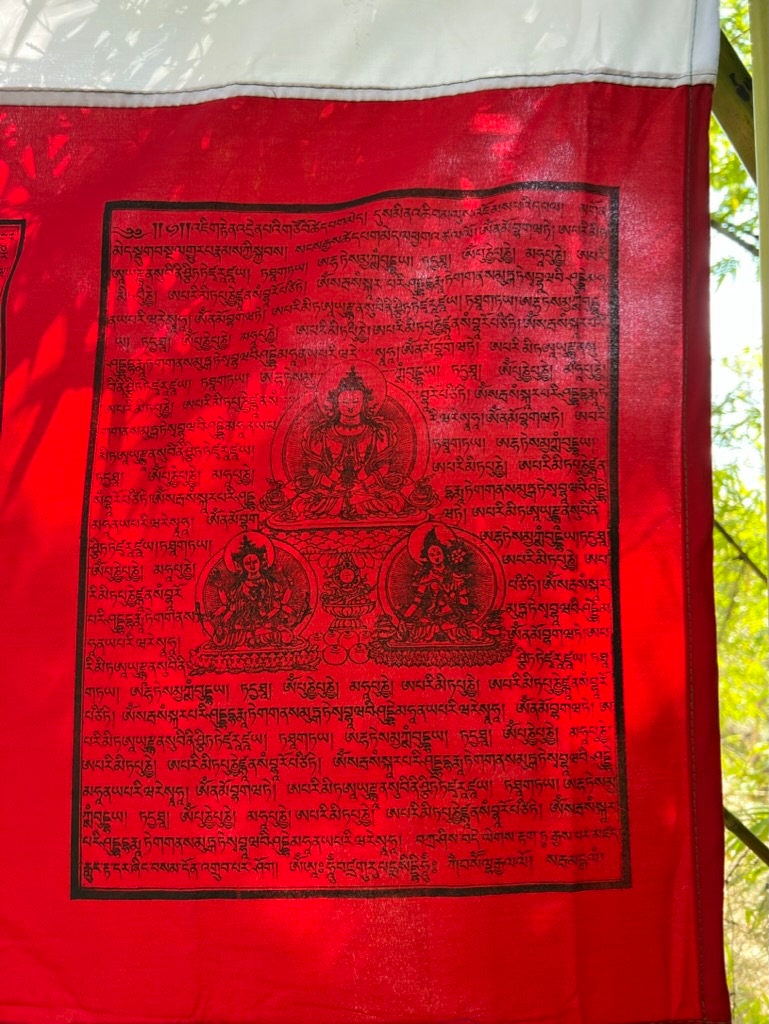 A stunning red section of a vertical Tibetan prayer flag banner, featuring deity images in 5 colors on 5 streamers. 28x81 inches, designed for pole hanging.
